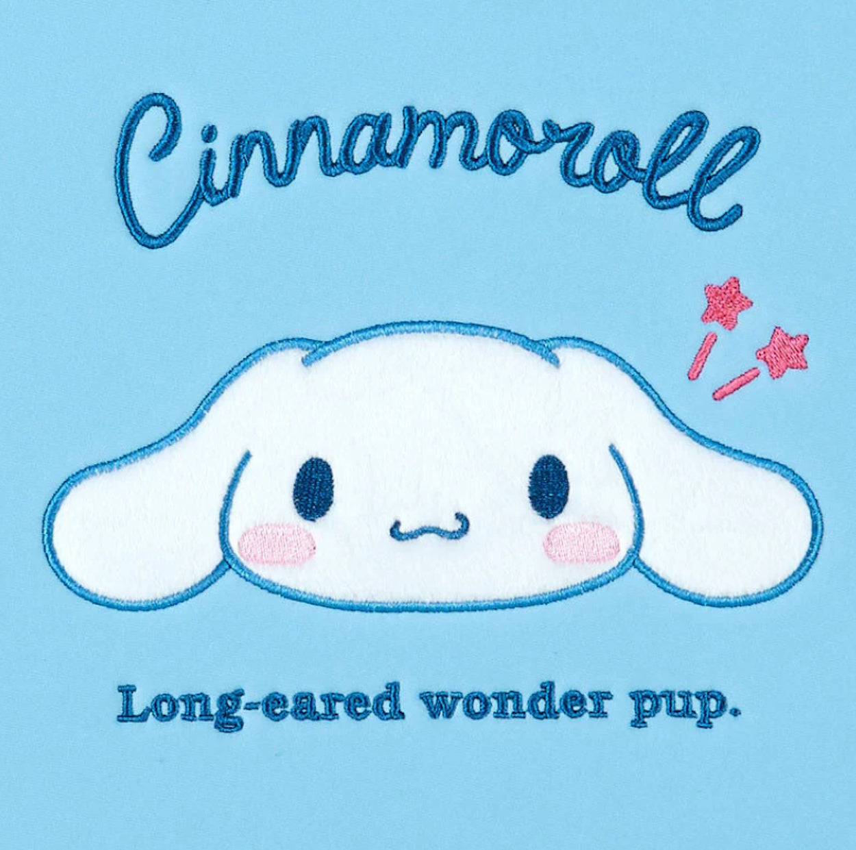 Sanrio Cinnamoroll padded laptop case close up of embroidered face