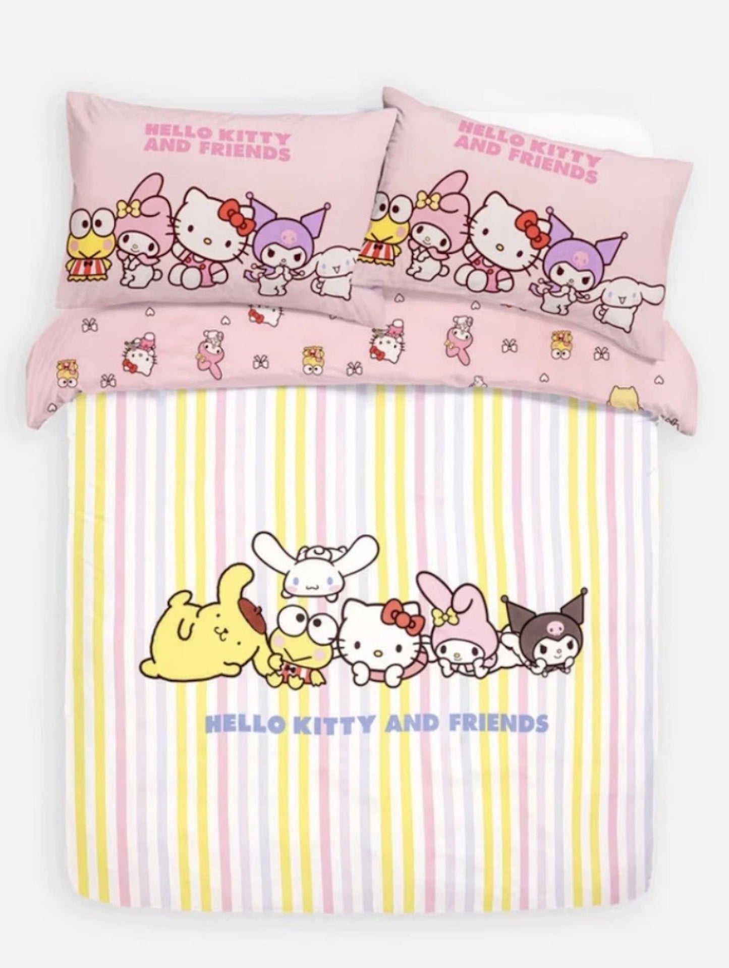 Hello Kitty and Friends bedding set with pink pillows and striped bedspread.