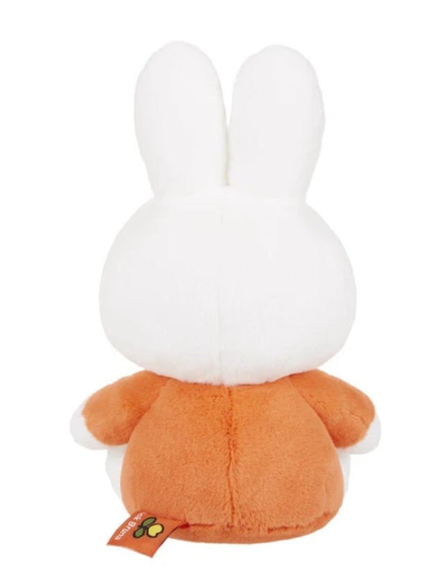 Sekiguchi Miffy Hug Me fluffy sitting plush toy wearing an orange outfit with a white collar and button detail Back view