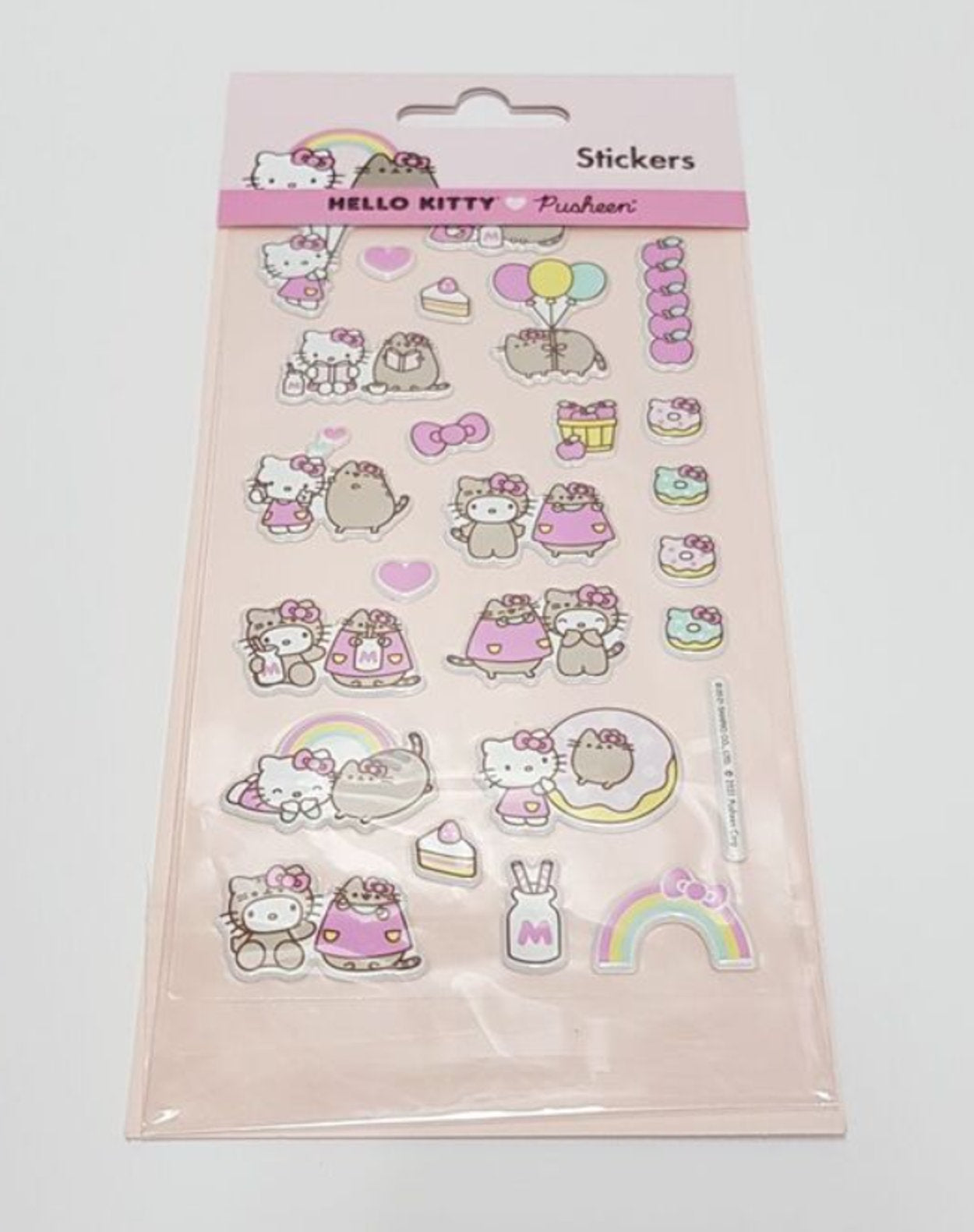 sheet of hello kitty and pusheen puffy stickers