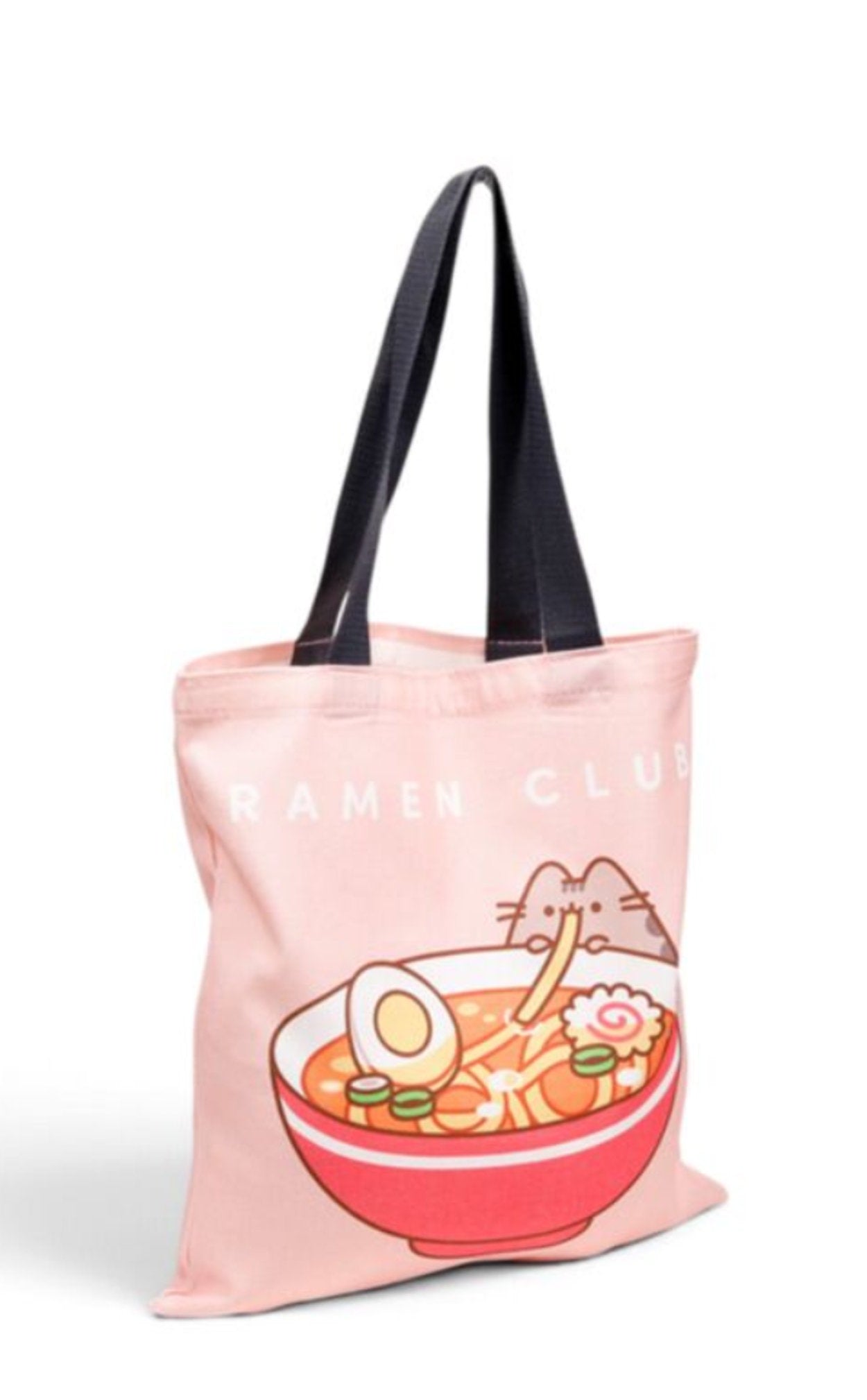 pusheen tote bag shown with goods inside