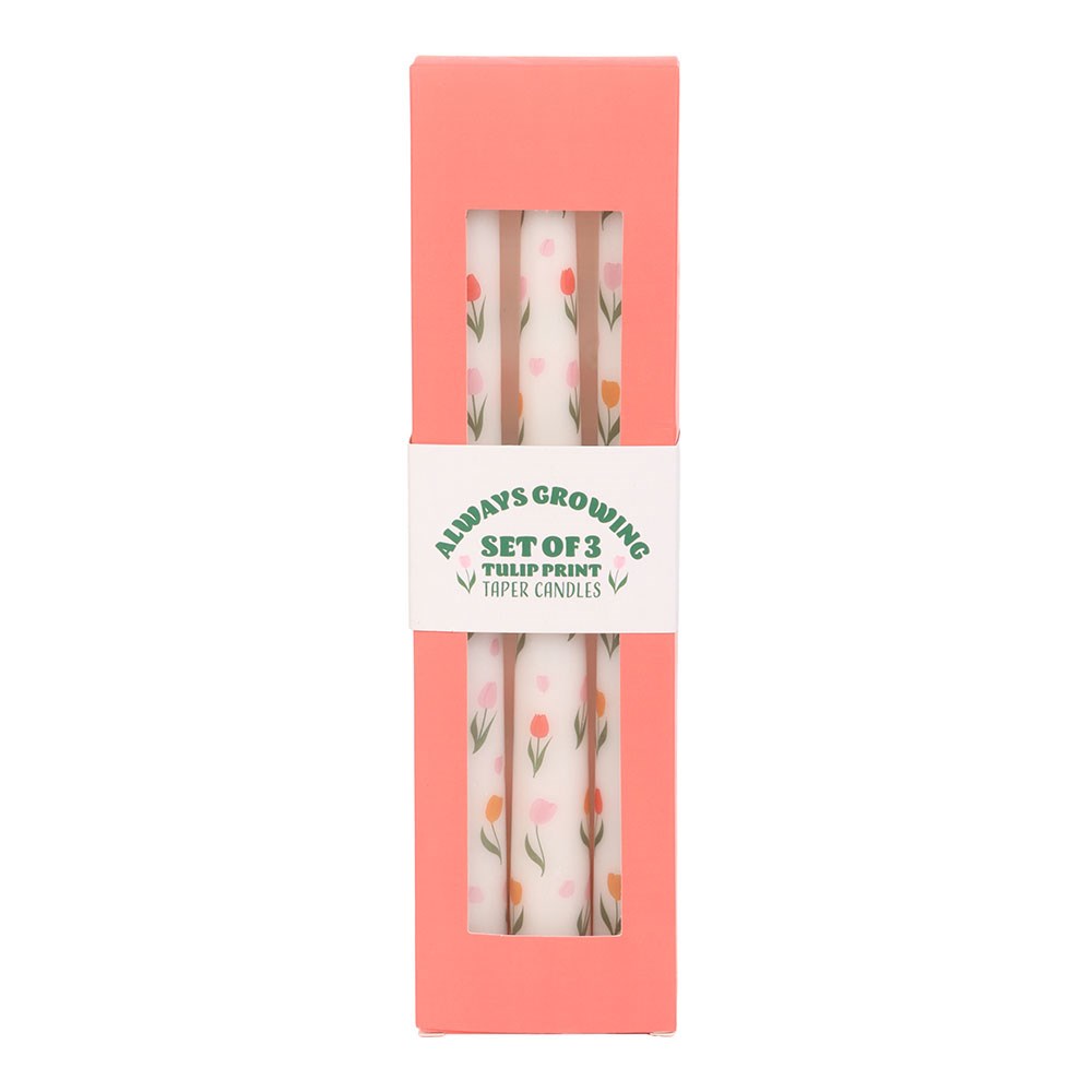 Set of three tulip print taper candles in packaging
