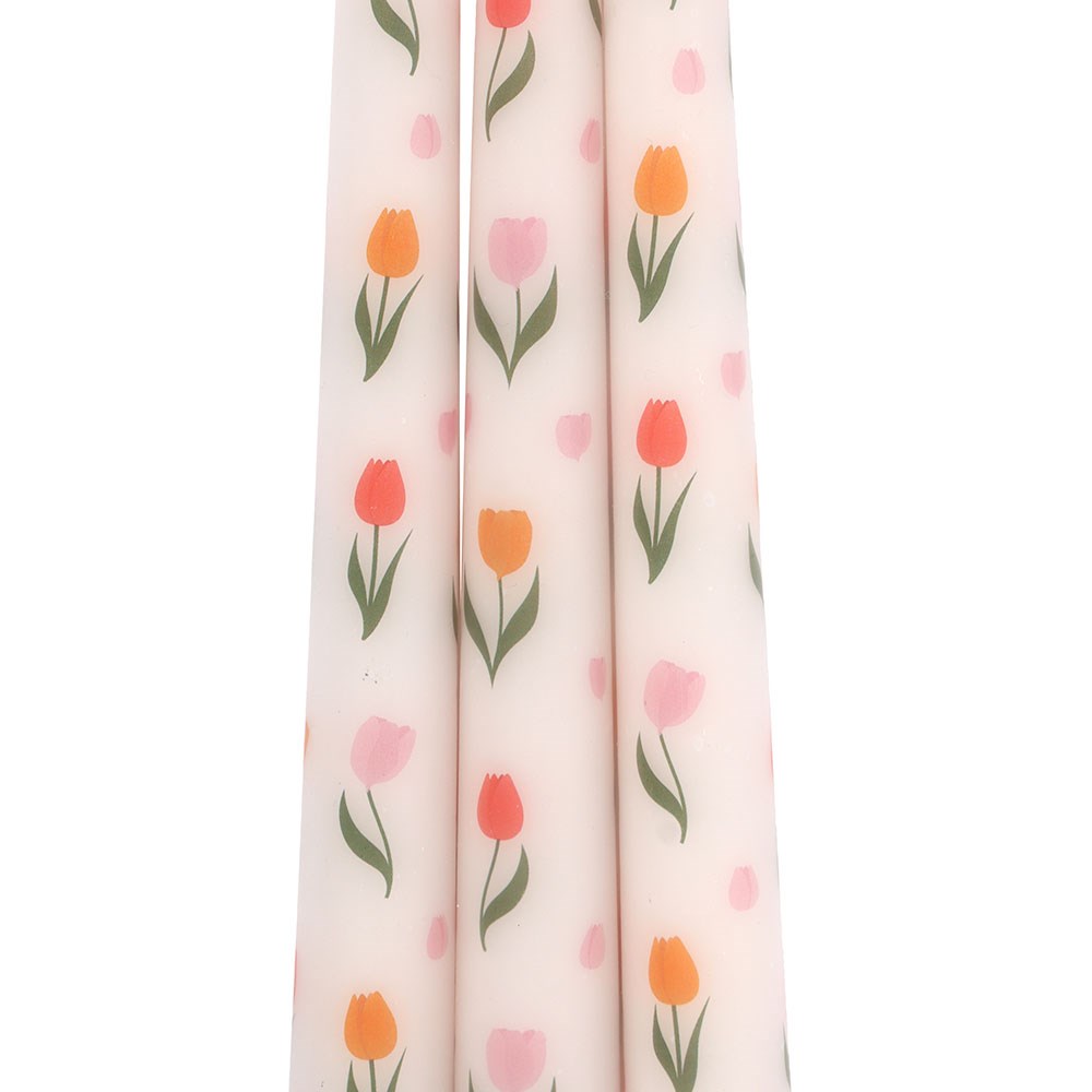 Close up of tulip print design on taper candles
