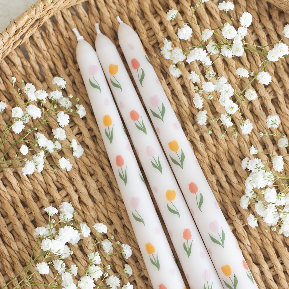 Kawaii tulip print taper candles styled on natural background